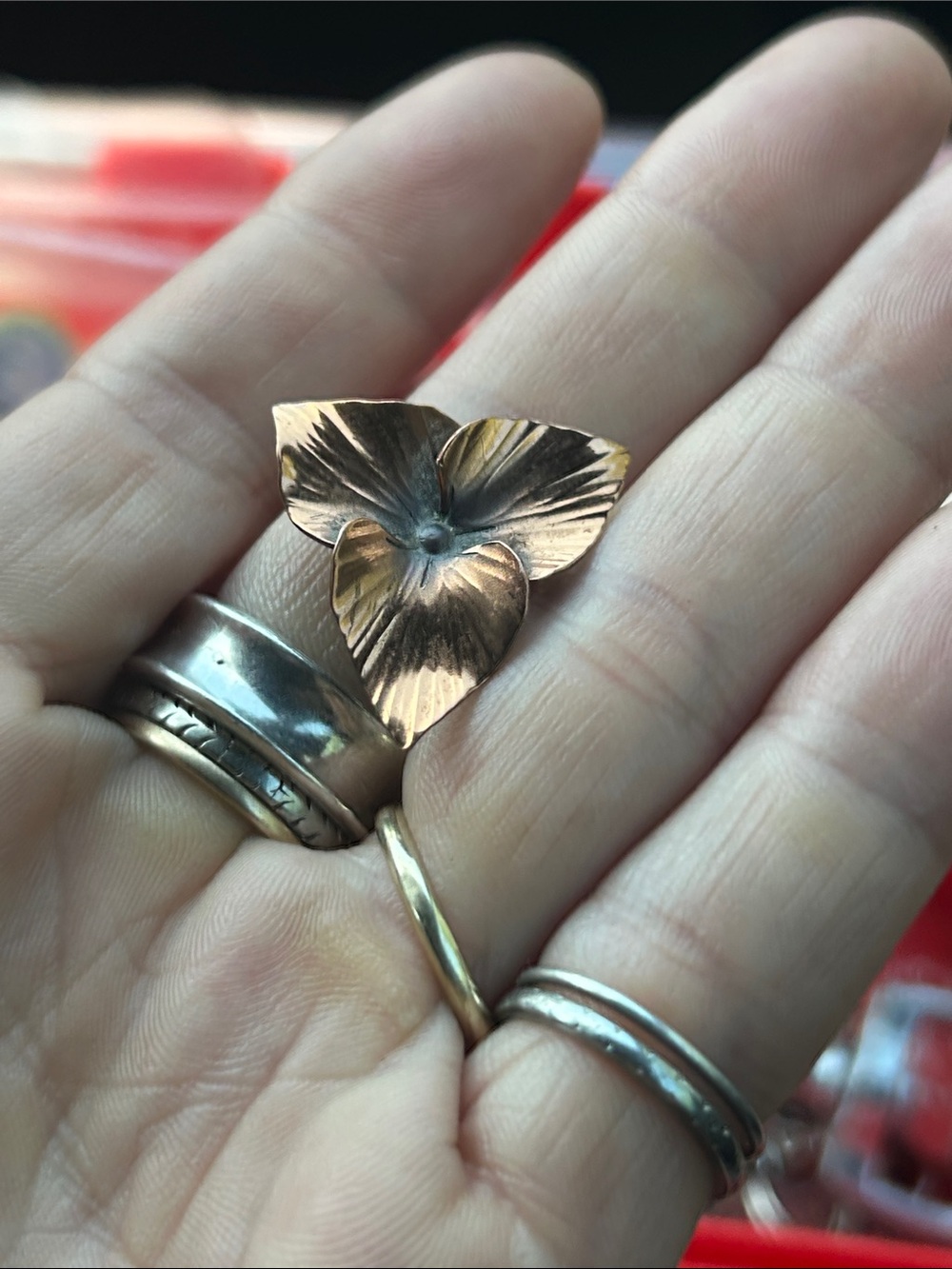Stuart Nye copper pansy cluster pin
